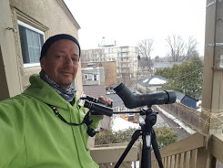 Ted on balcony with equipment